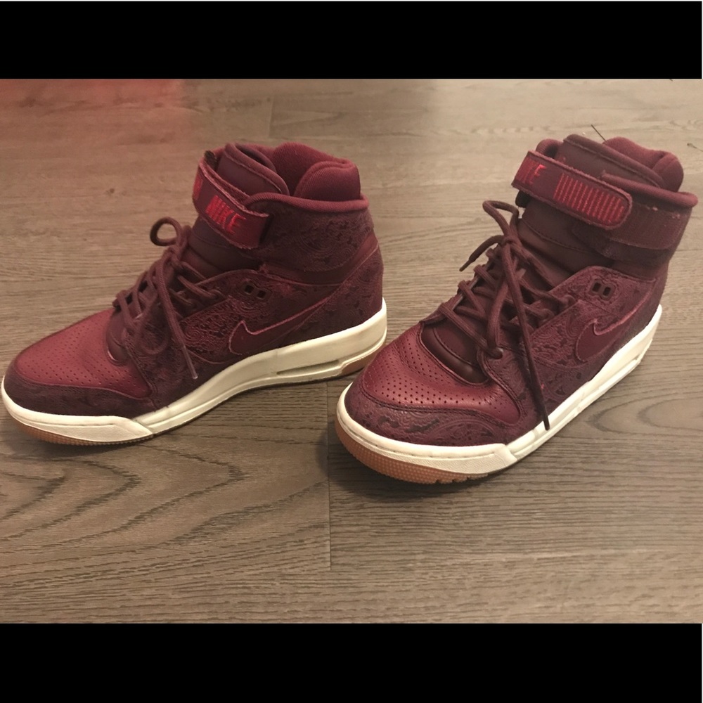 Maroon Nike shoe with design on side